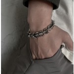 Homme personnalité dominant quille bracelet de mode ins niche design haut de gamme sens punk tendance ne perd pas de couleur accessoires